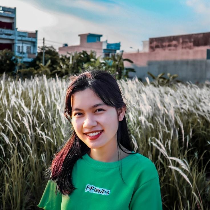 Kaveri Mehta, Lead Design Curator at TimberGentleVale, reviewing corporate floral arrangements